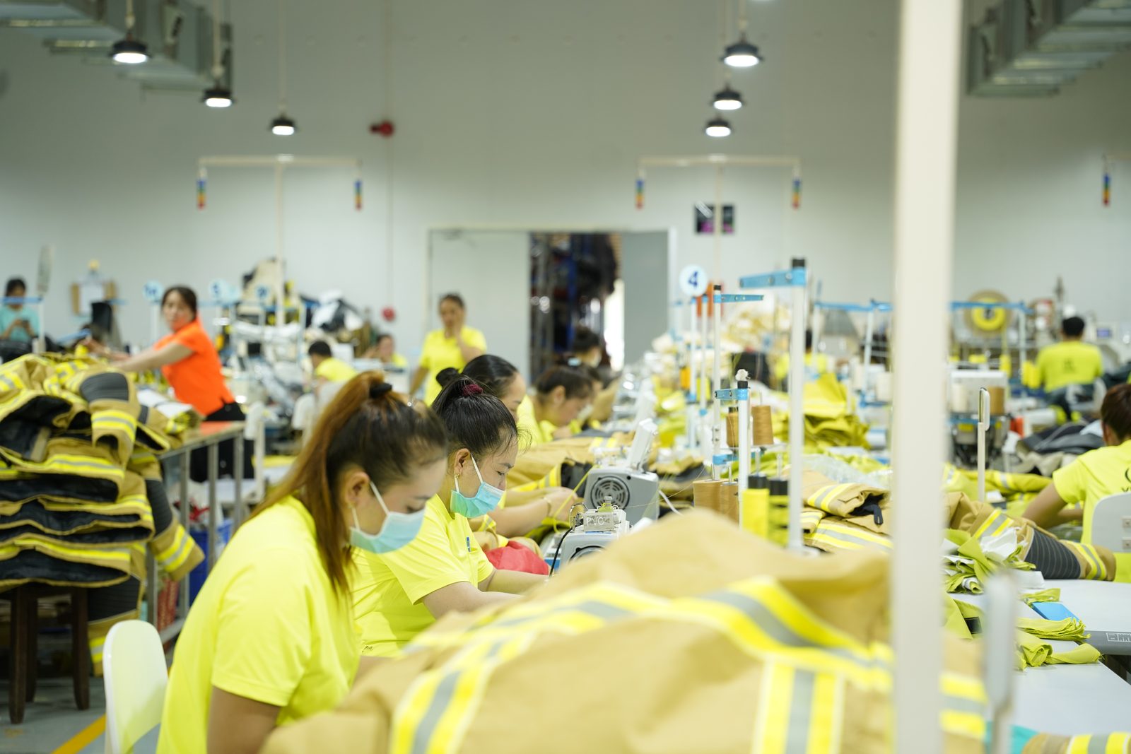 A Viking Vietnam sewing line producing protective garments with reflective detail