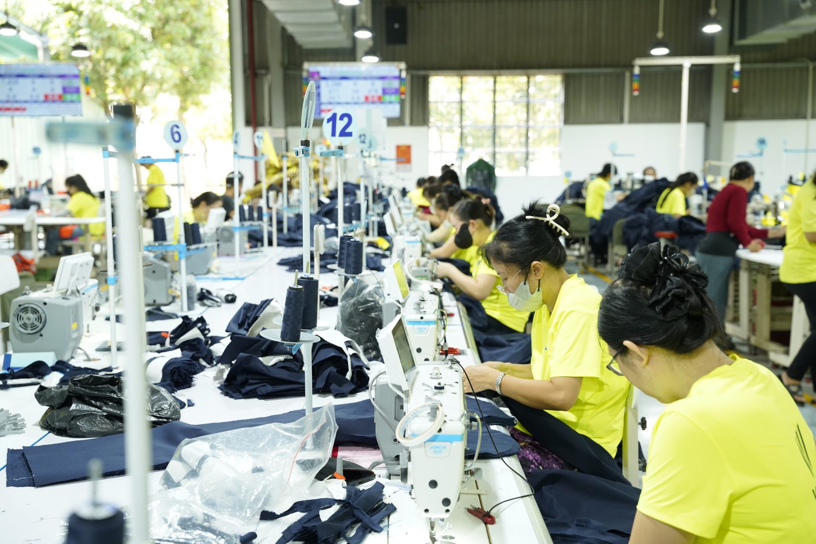 Semi finished parts organised by operation group on a Viking Vietnam sewing line