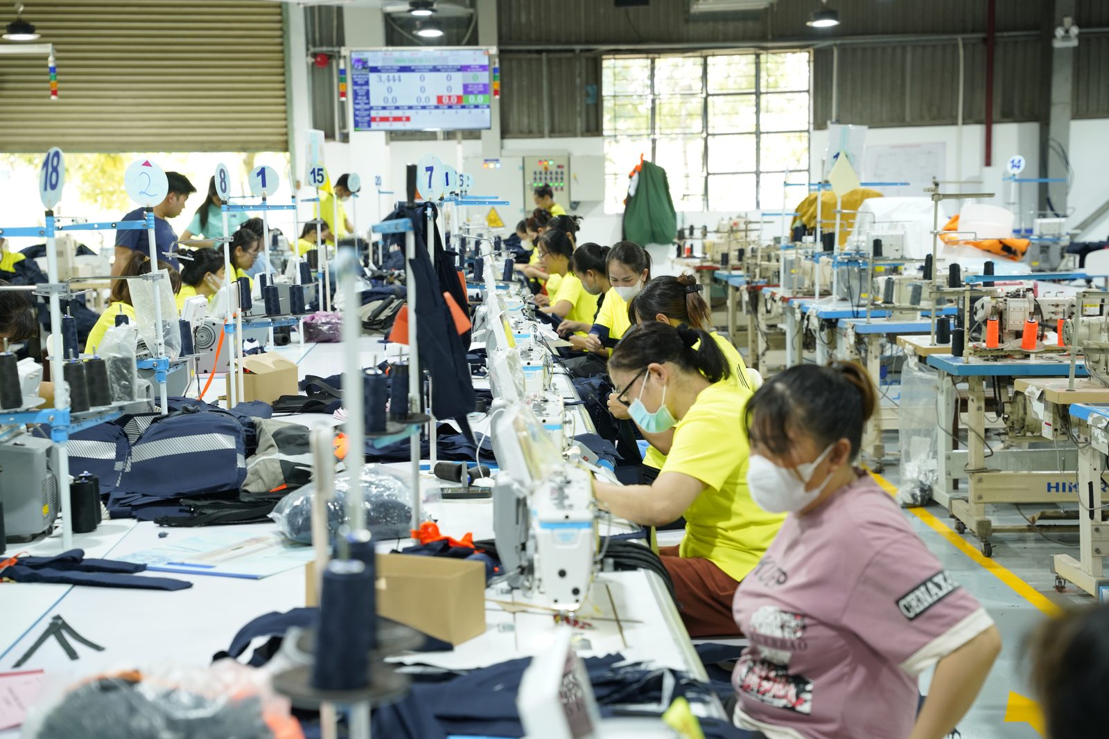A production data board above the sewing line at Viking Vietnam, used to track output and progress during the day