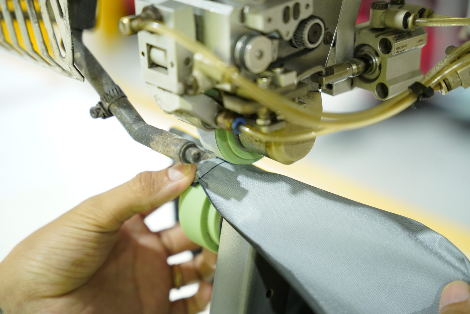 Seam taping operation on technical fabric