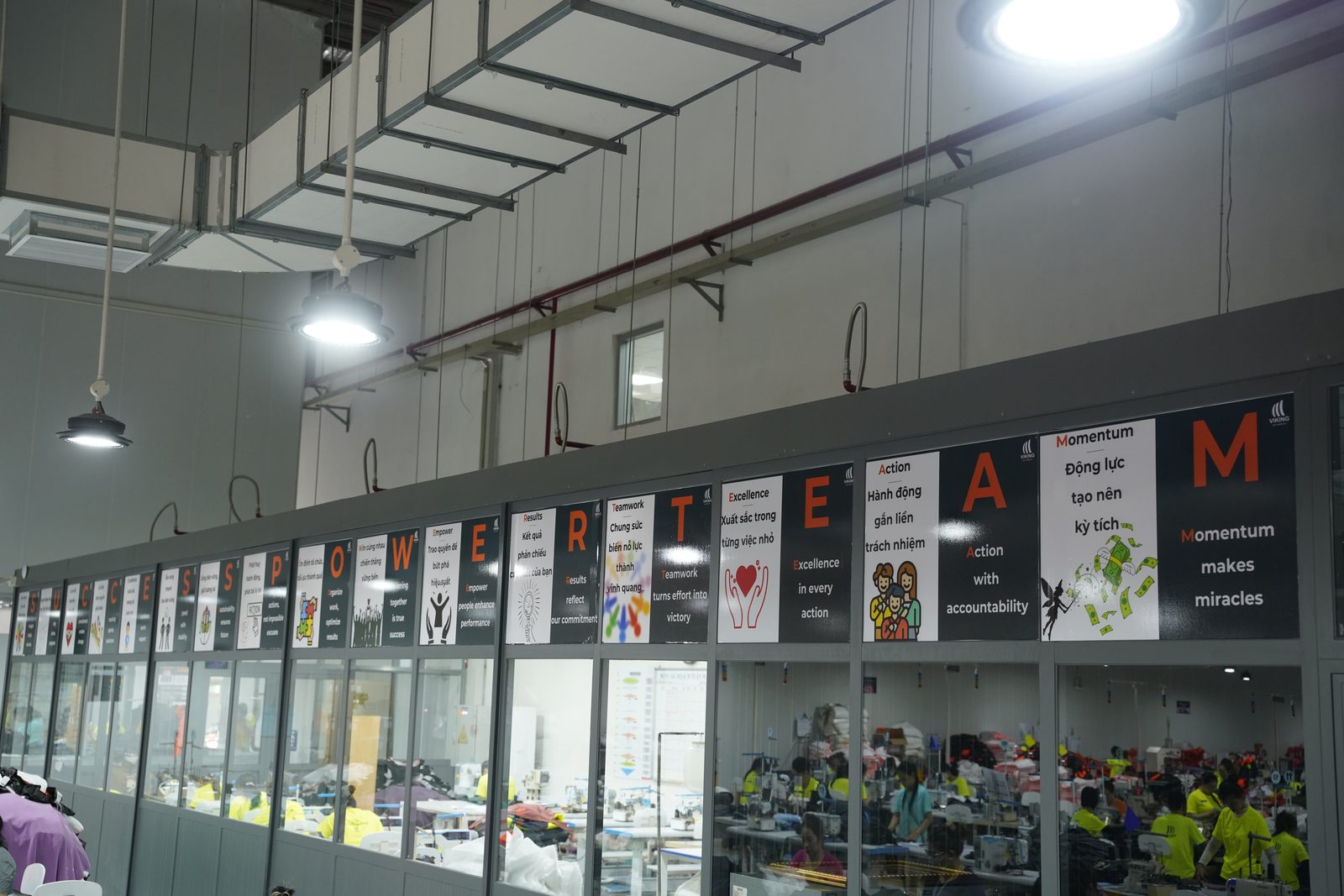 Viking Vietnam culture and values boards along the corridor overlooking the production floor