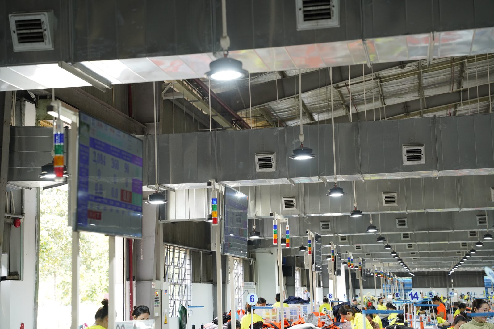 Production monitoring screens along the sewing line at Viking Vietnam